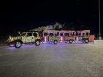 Giant Tiger’s Tiger Train parks outside for a festive evening. 