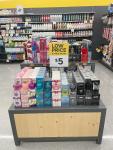 Giant Tiger Camrose, Alta., featuring a table with men’s and women’s perfumes displayed, with a sign that says “Low Price is what we do. $5”