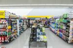 Giant Tiger Vaughan, Ont., aisle featuring items such as halls, body spray, toilet paper, paper towel, deodorant, shampoo, and conditioner are being displayed. 