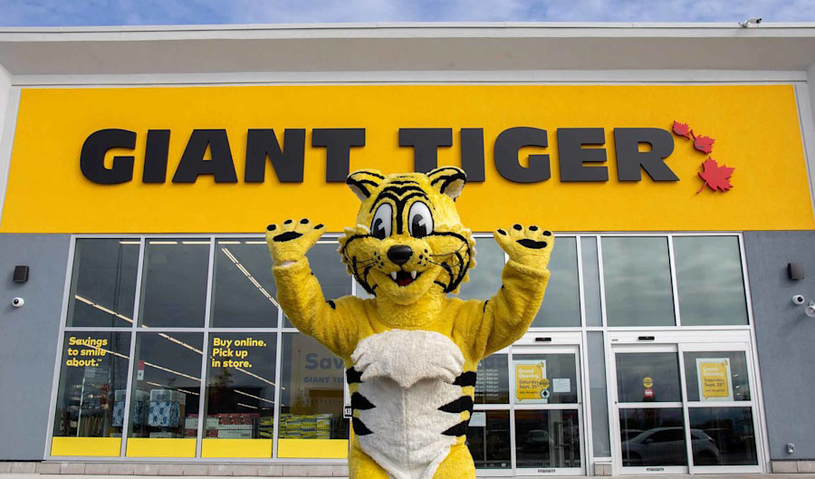 Friendly standing in front of Giant Tiger store